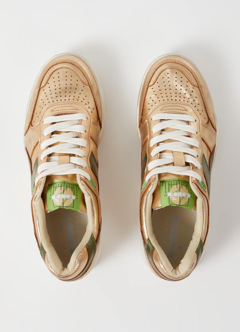 Diadora B560 lietotas ādas kedas ar metālisku apdari