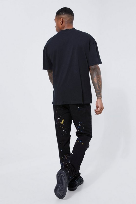Slim-Fit Schlagjeans mit Farbspritzern