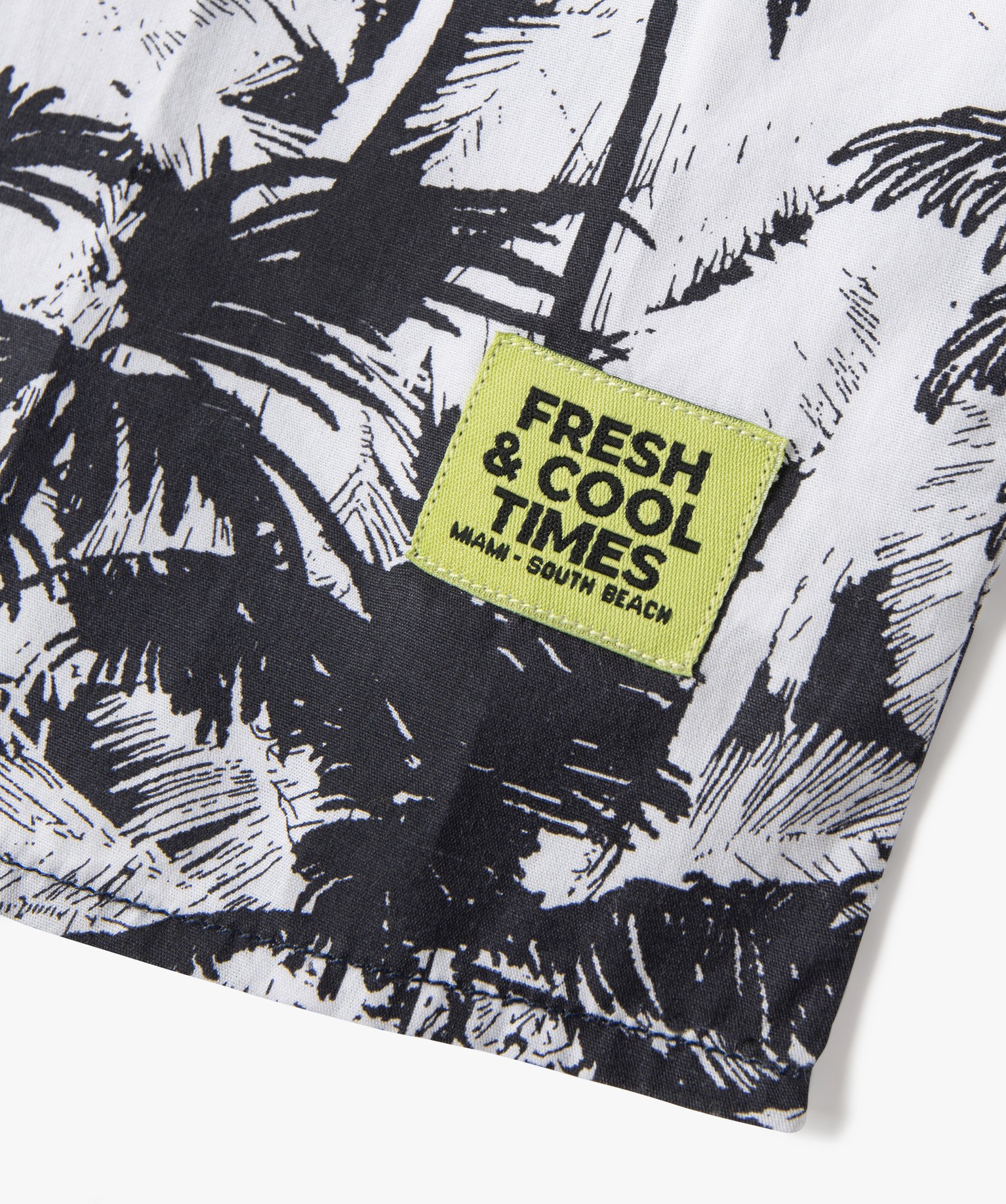 Chemise Garçon à manches courtes avec motifs palmiers blanc | GEMO