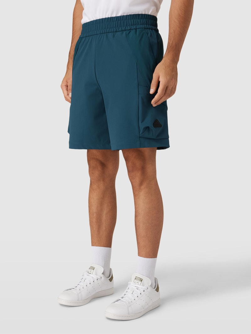 Shorts mit Cargotaschen in petrol