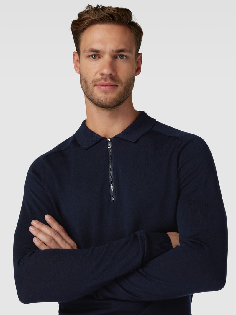 Pullover mit Polokragen aus Schurwolle in marineblau