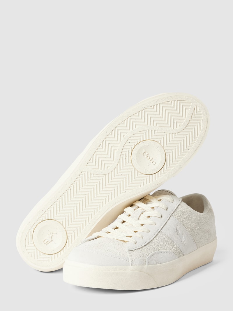 Sneaker mit Teddyfell-Besatz in offwhite