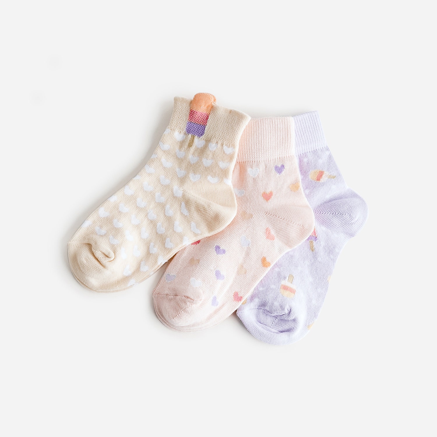 Chaussettes mi-hautes lilas, roses, jaune clair