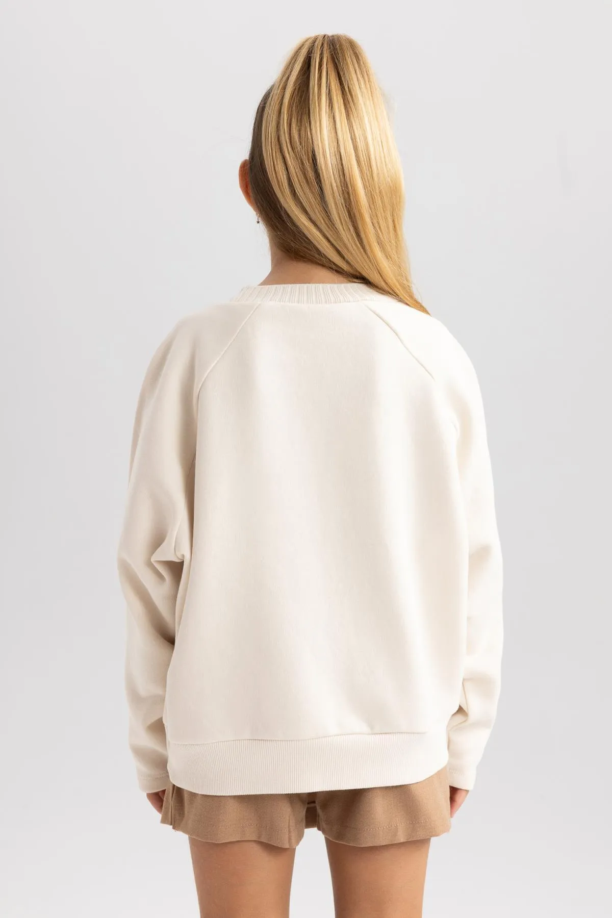 DeFacto  Weiches, pelziges Sweatshirt mit Rundhalsausschnitt für Mädchen in Oversize-Passform B1976a823au