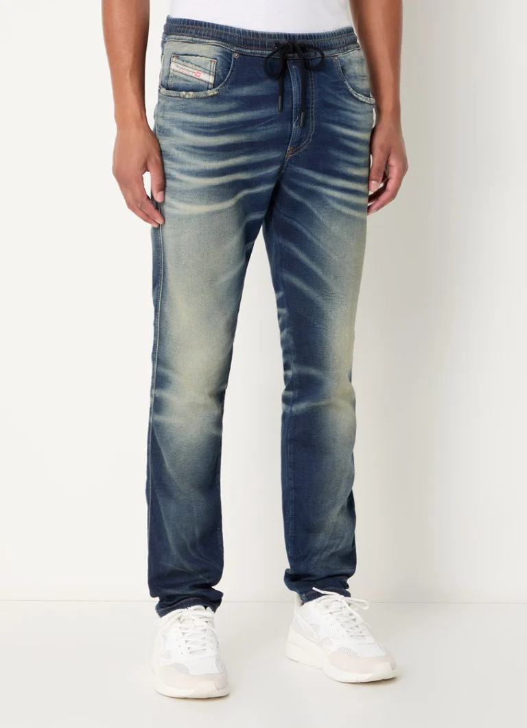 Diesel D-Strukt JoggJeans® pieguļošas džinsa bikses ar mazgātu apdari