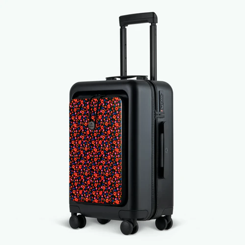 ORLY 4-wheel hard-shell suitcase with MAD black pouch