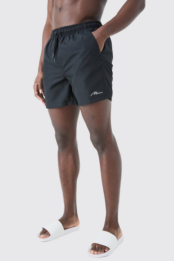 Man Signature mittellange Badehose