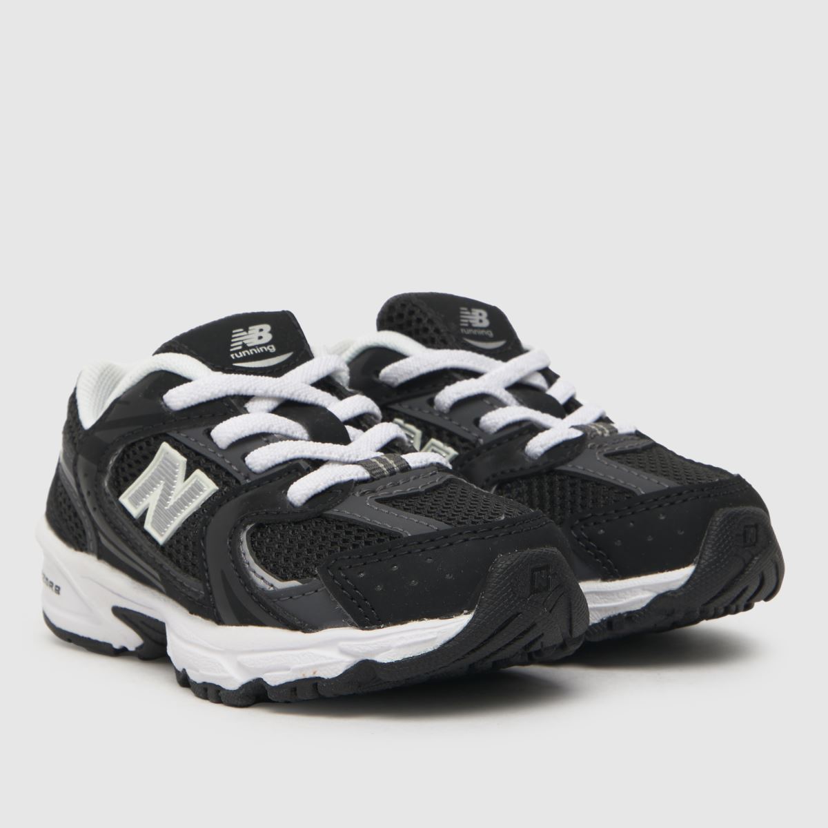 New Balance svarta och grå 530 småbarnsskor