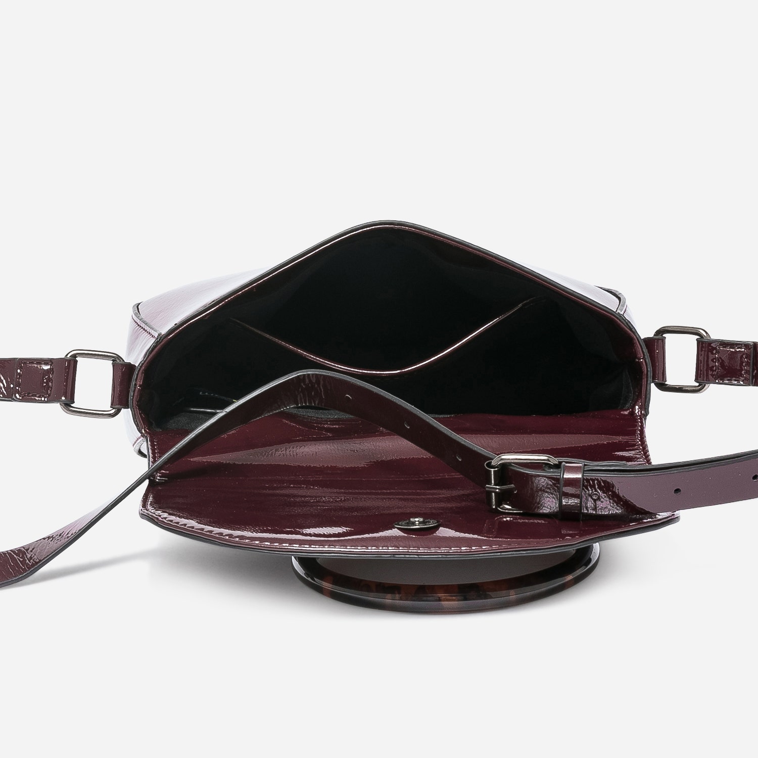 Sac à main bordeaux verni avec maxi anneau écaille
