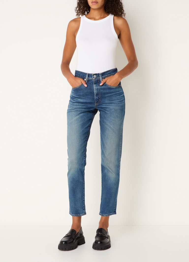 Blugi Levi's cu talie înaltă, croială slim, croiți, într-o nuanță medie.