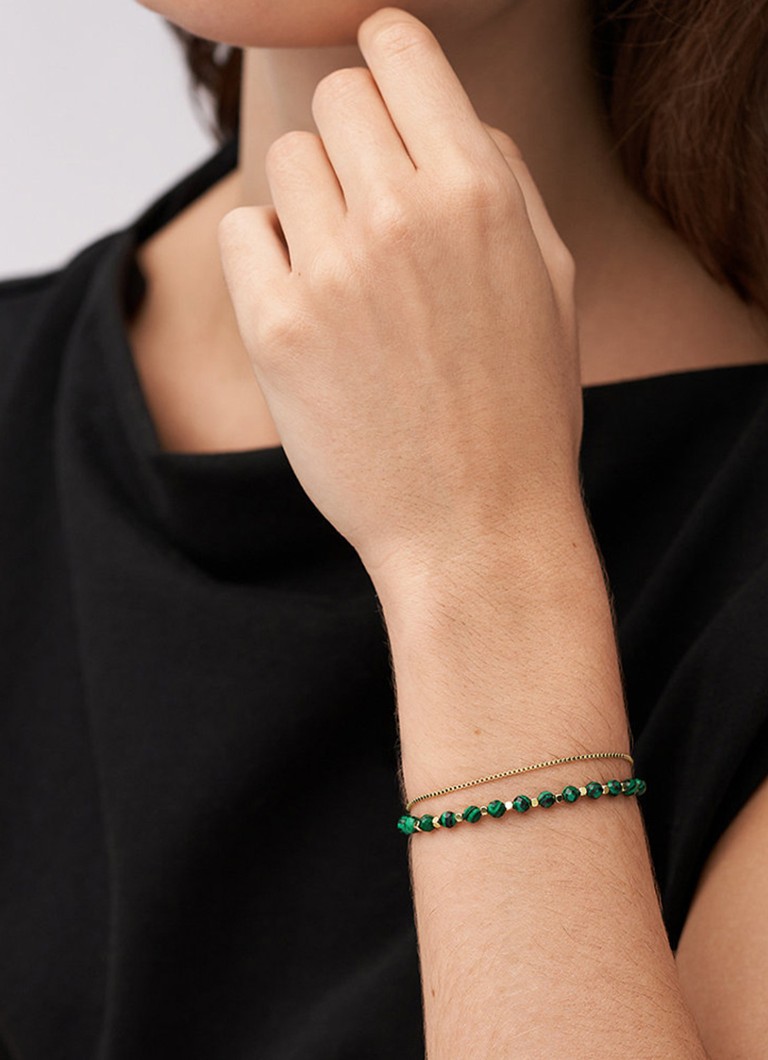 Bracciale con perline fossili JF04541710