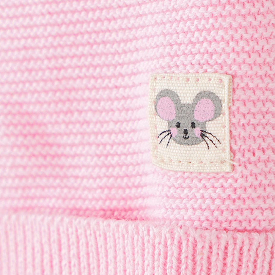 Newborn Strickhose mit Zierknöpfen
