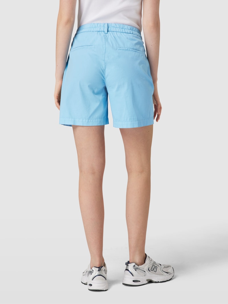 Bermudas mit Eingrifftasche in ozean blau