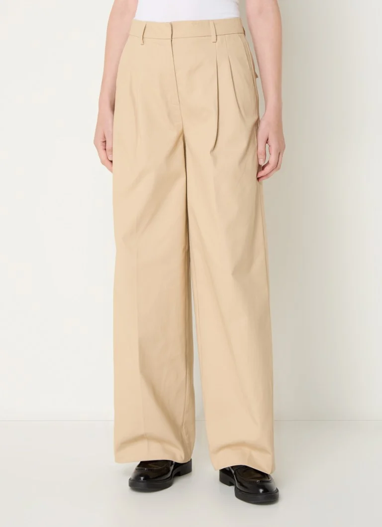 Pantaloni chino de damă Iben, cu talie înaltă, lejeri pe picioare și buzunare laterale.