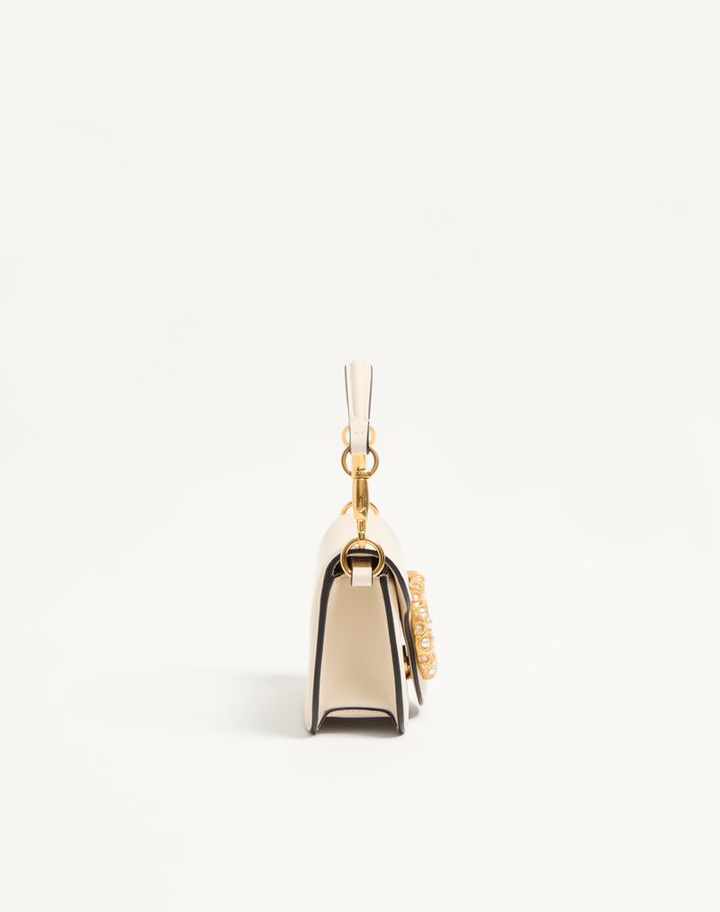 Bolsa de ombro pequena Valentino Garavani Locò em couro de bezerro com logotipo de joia.
