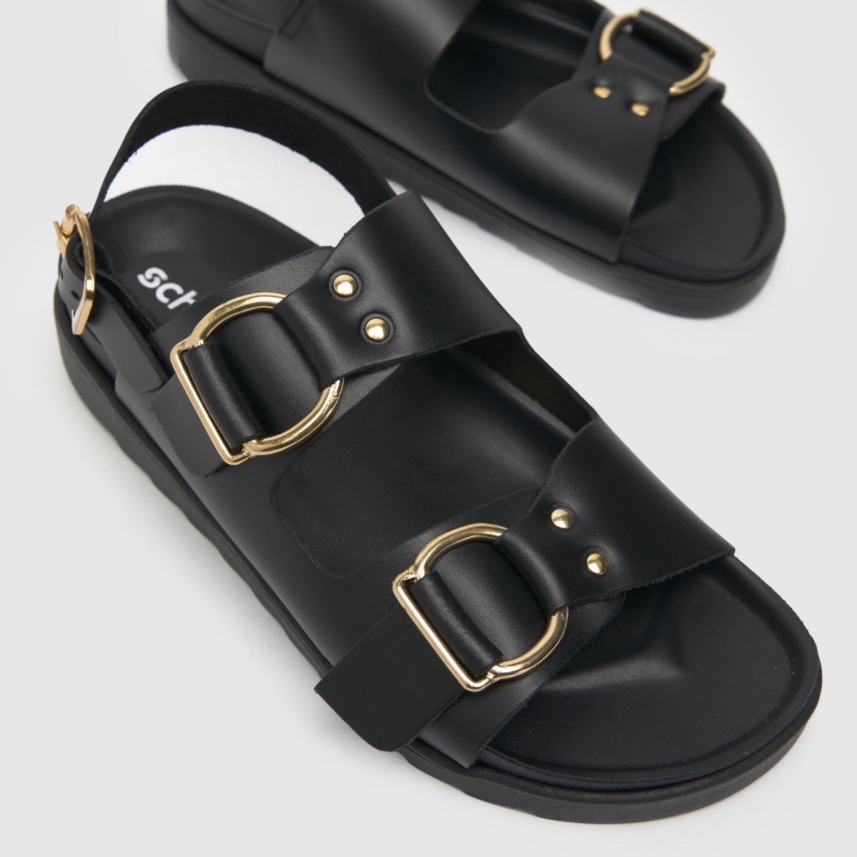 Schuh Tegan csatos szandálok fekete színben