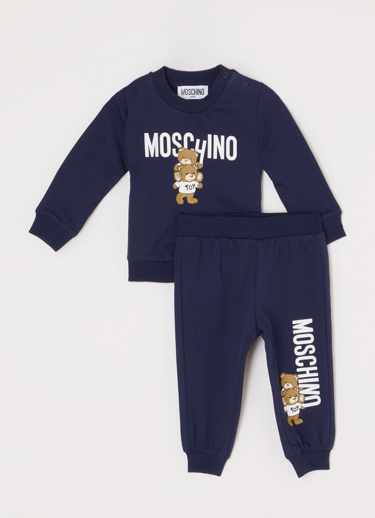 Completo due pezzi Moschino composto da maglione e pantaloni della tuta