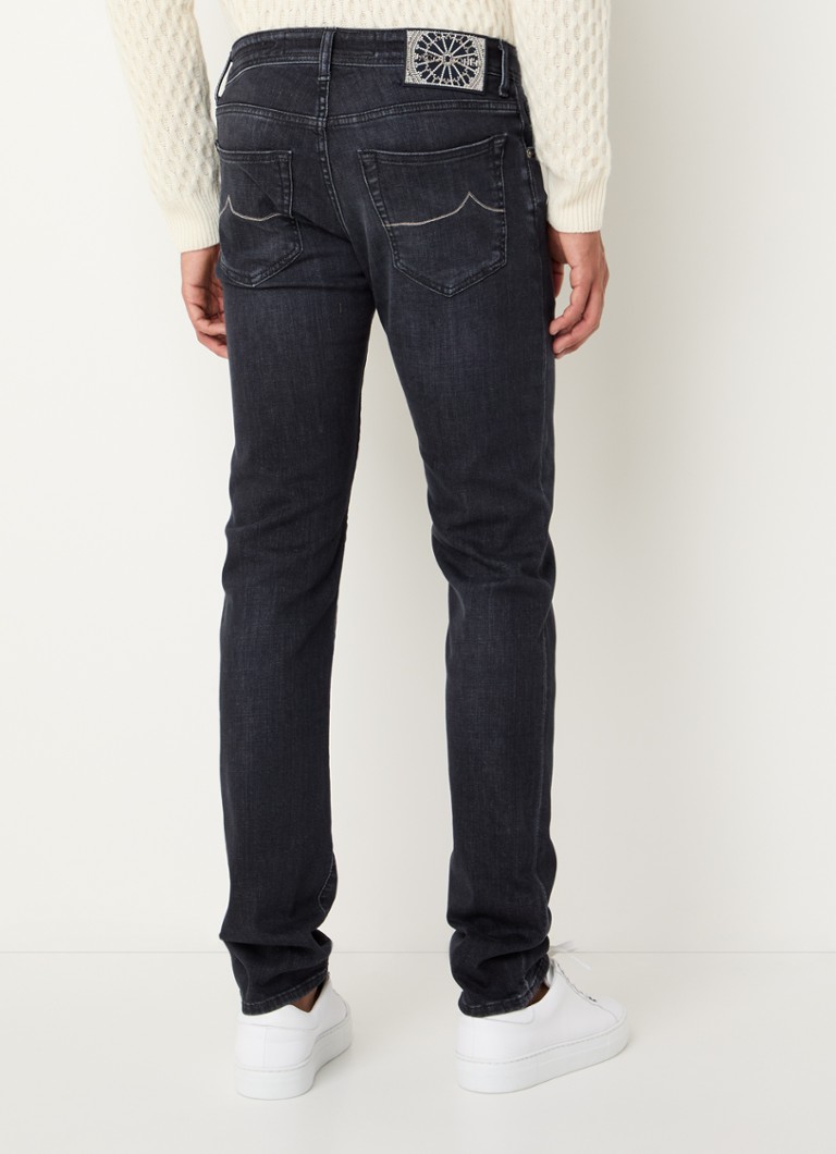 Blugi slim fit Nick de la Jacob Cohen, cu efect uzat.