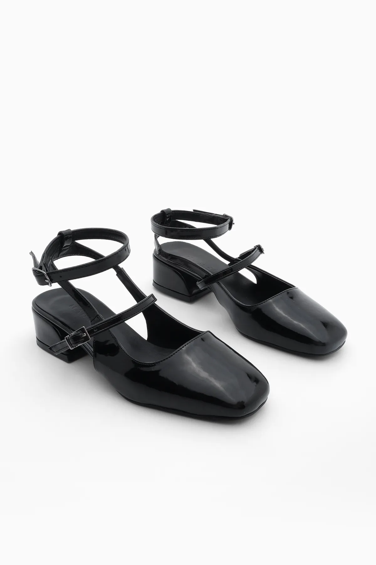 Marjin  Damen-Mary-Jane-Schuhe mit Schutzhelm, quadratischer Zehenpartie und offenem Rücken, kurzer Blockabsatz, Hanse, schwarzes Lackleder