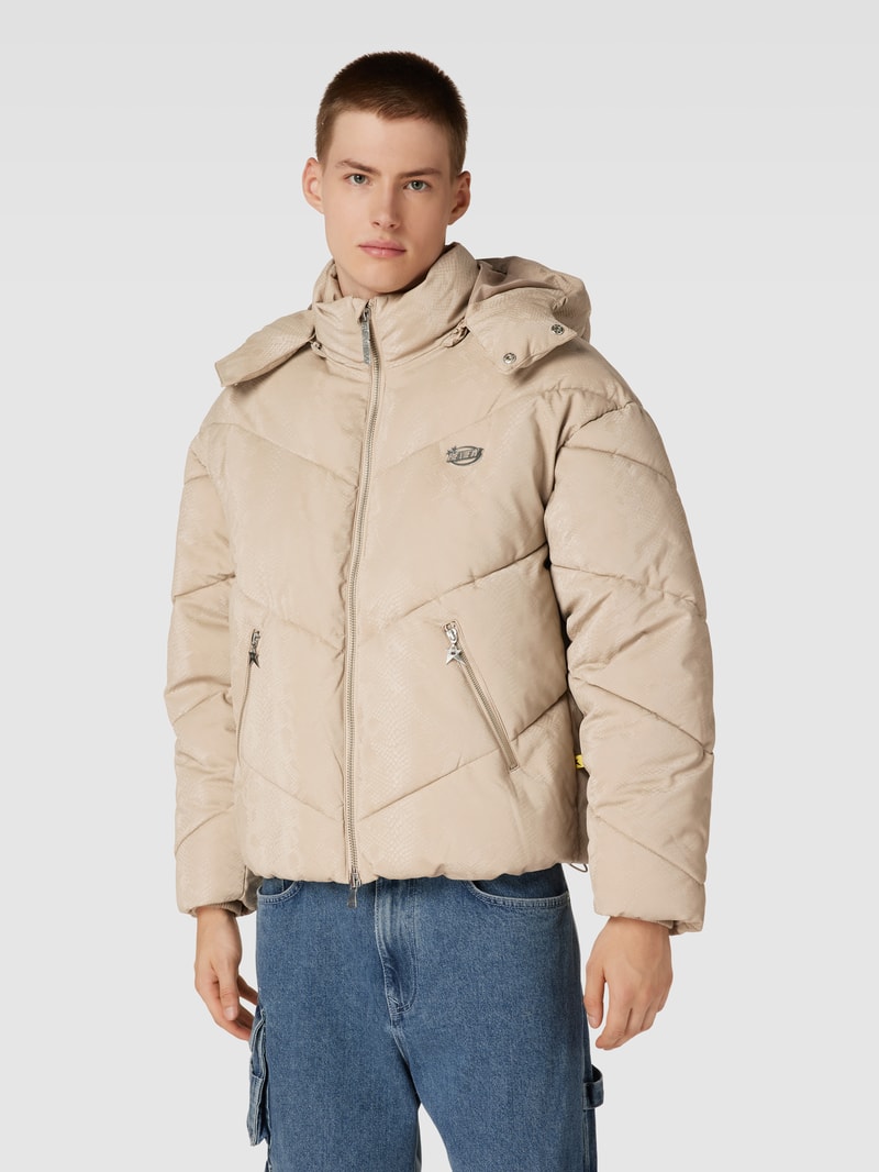Steppjacke mit Schlangenmuster in ecru