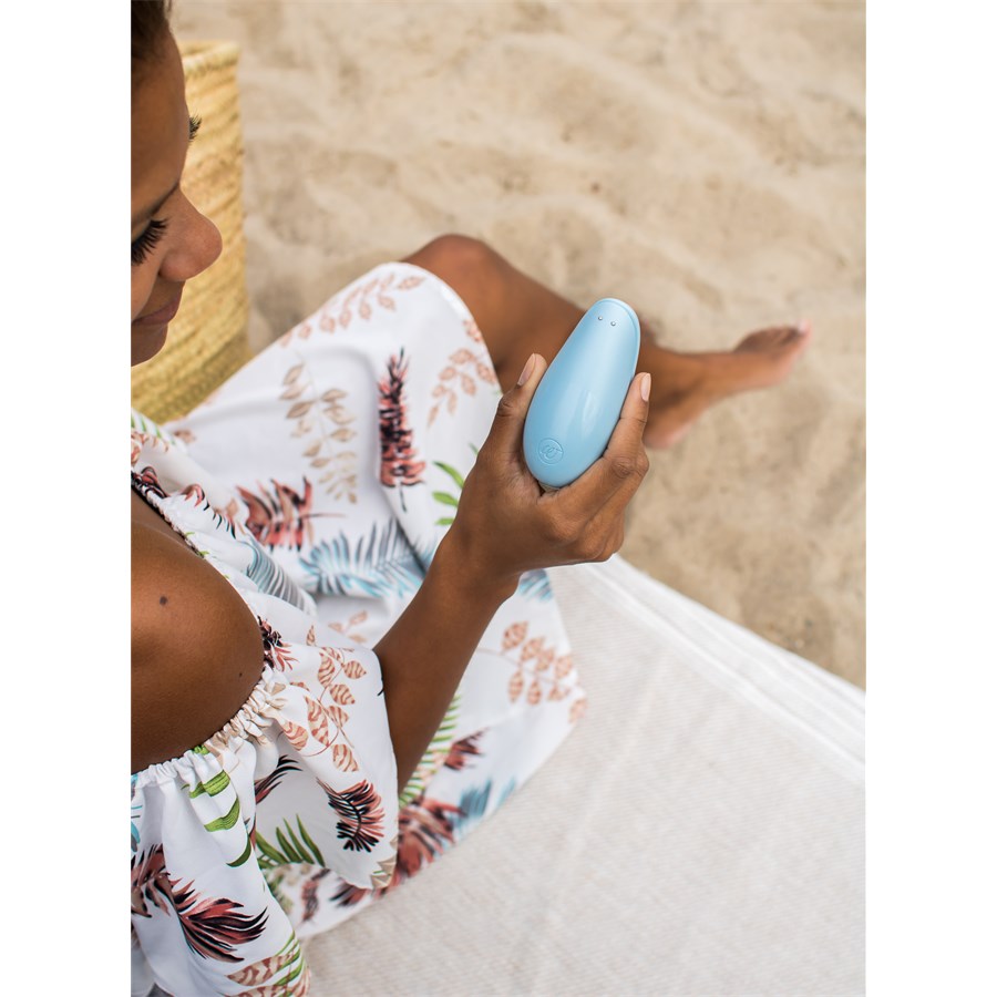 Vibrateur à vide Womanizer, bleu clair