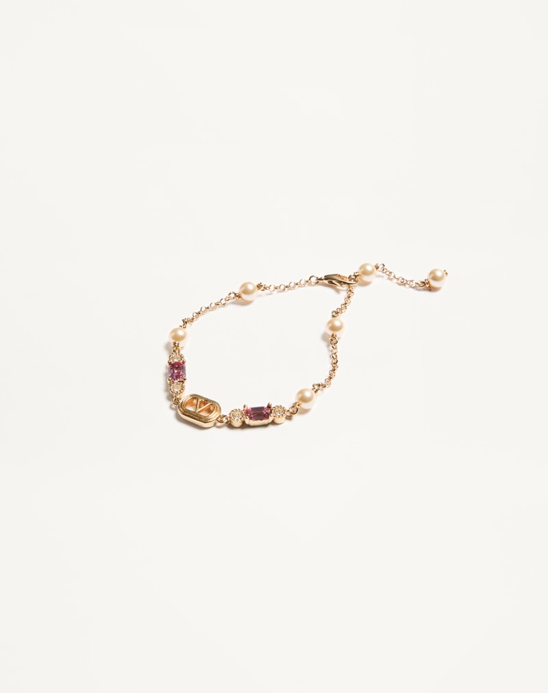 Ovalet armbånd i metal, perler og Swarovski® krystaller