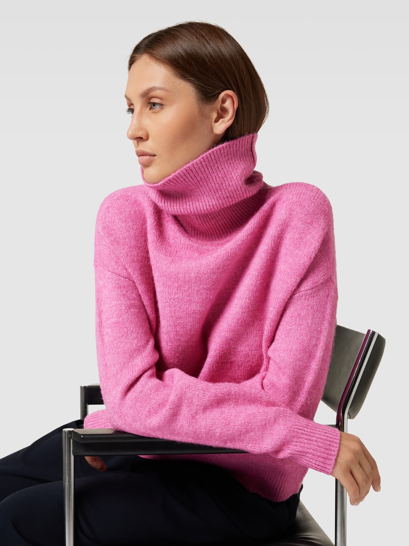 Rollkragenpullover mit überschnittenen Schultern in pink