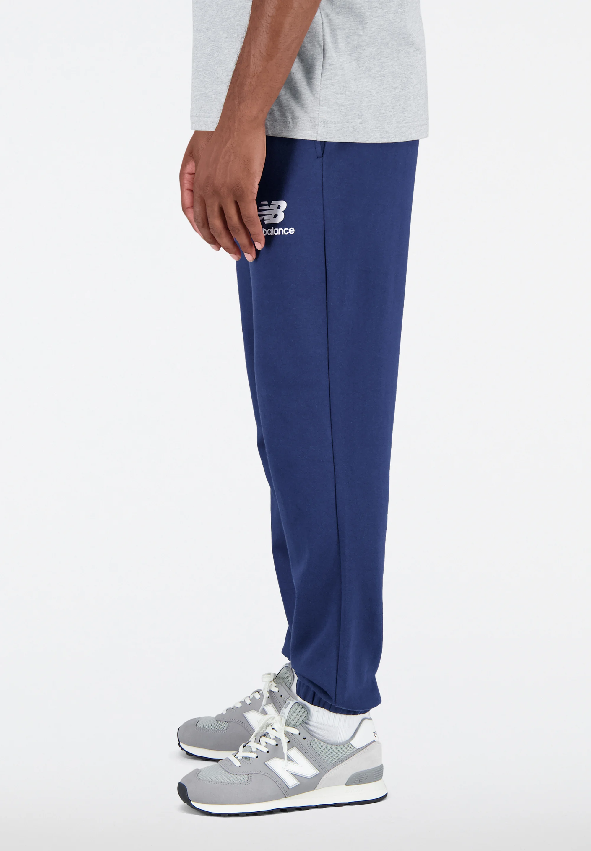 New Balance ESSENTIALS STACKED LOGO - Pantalones de chándal