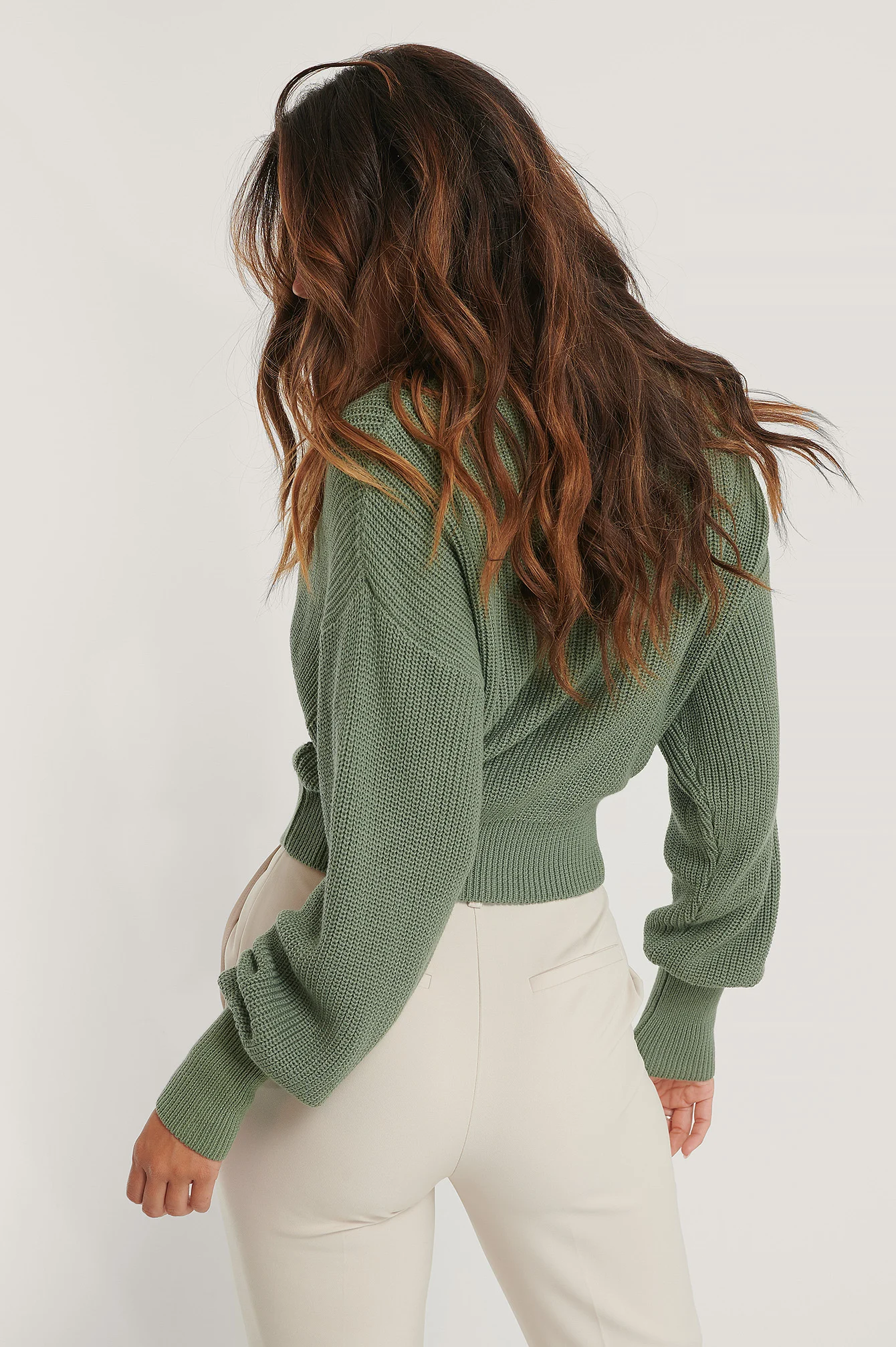 Strickpulli mit weiten Ärmeln