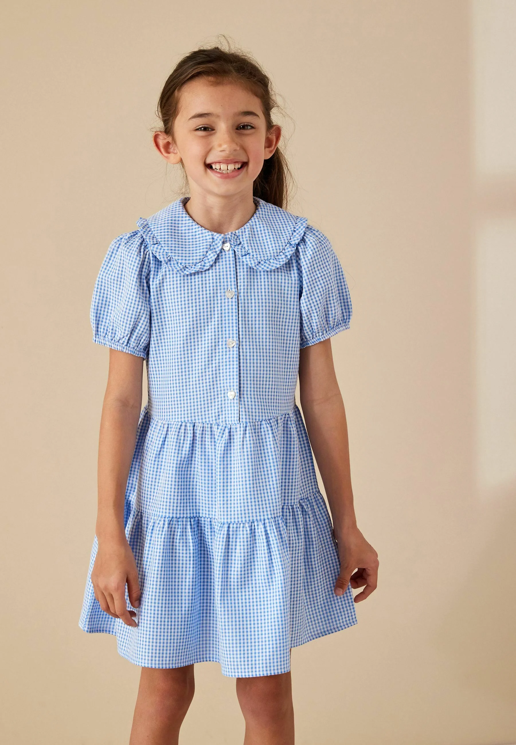 Siguiente vestido de verano con estampado de cuadros escalonados de la escuela Rich