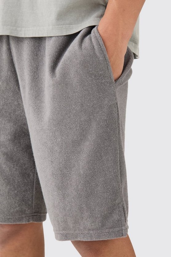 Lockere Frottee-Shorts mit geteiltem Saum