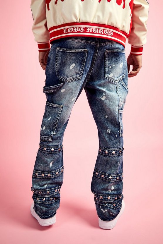 Slim-Fit Schlagjeans mit verziertem Riemchen-Detail