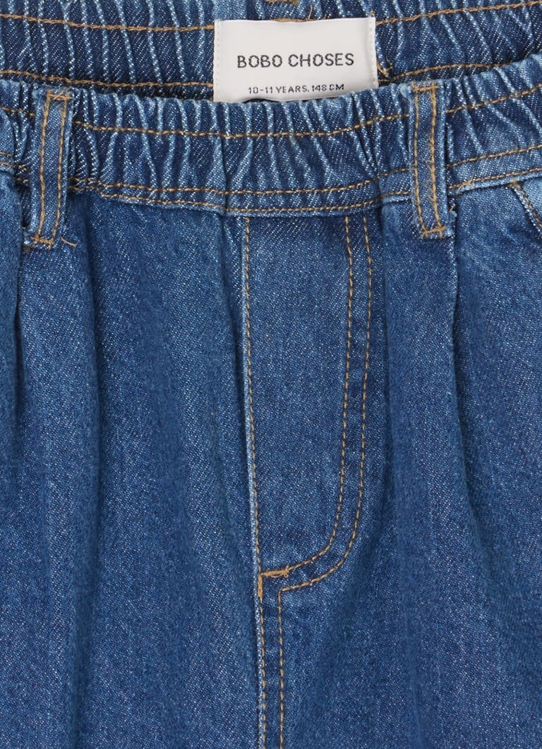 BOBO CHOSES Jeans a gamba larga con stampa di faccine divertenti