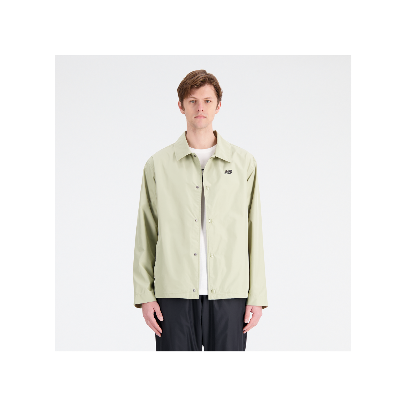 New Balance Essentials Coaches Jacke Schwarz F515