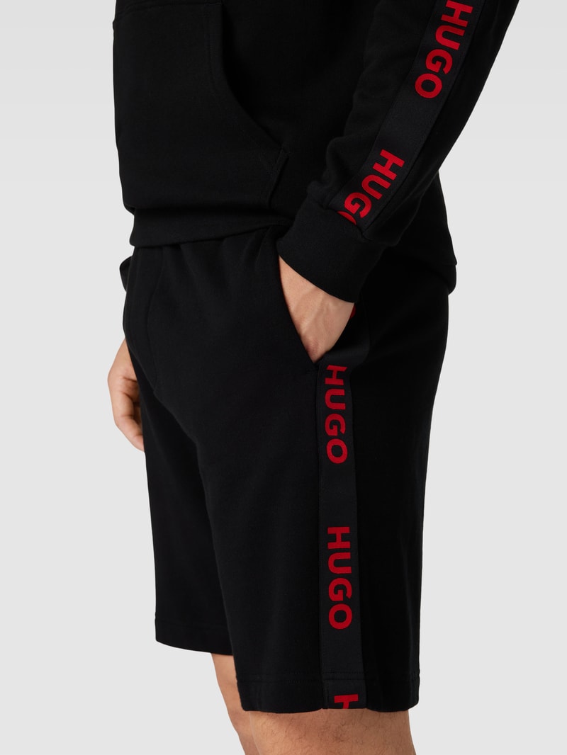 Sweatshorts mit Logo-Details Modell 'Sporty' in schwarz