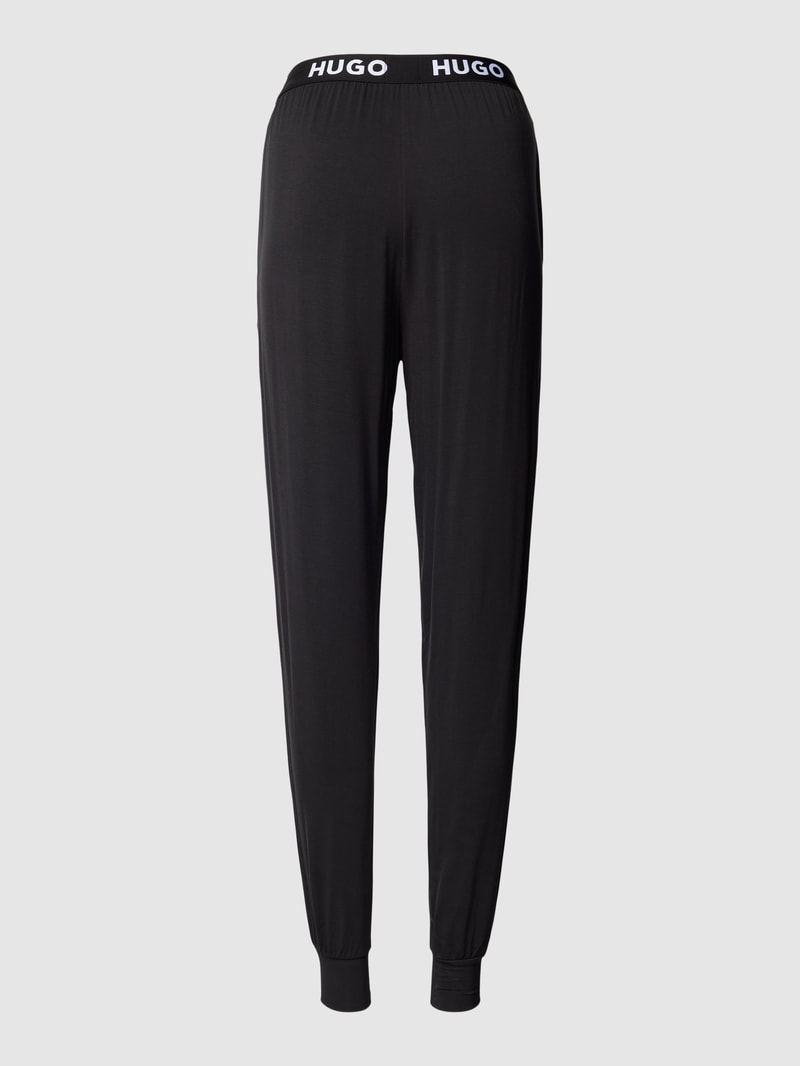 Sweatpants mit elastischem Logo-Bund Modell 'UNITE' in schwarz