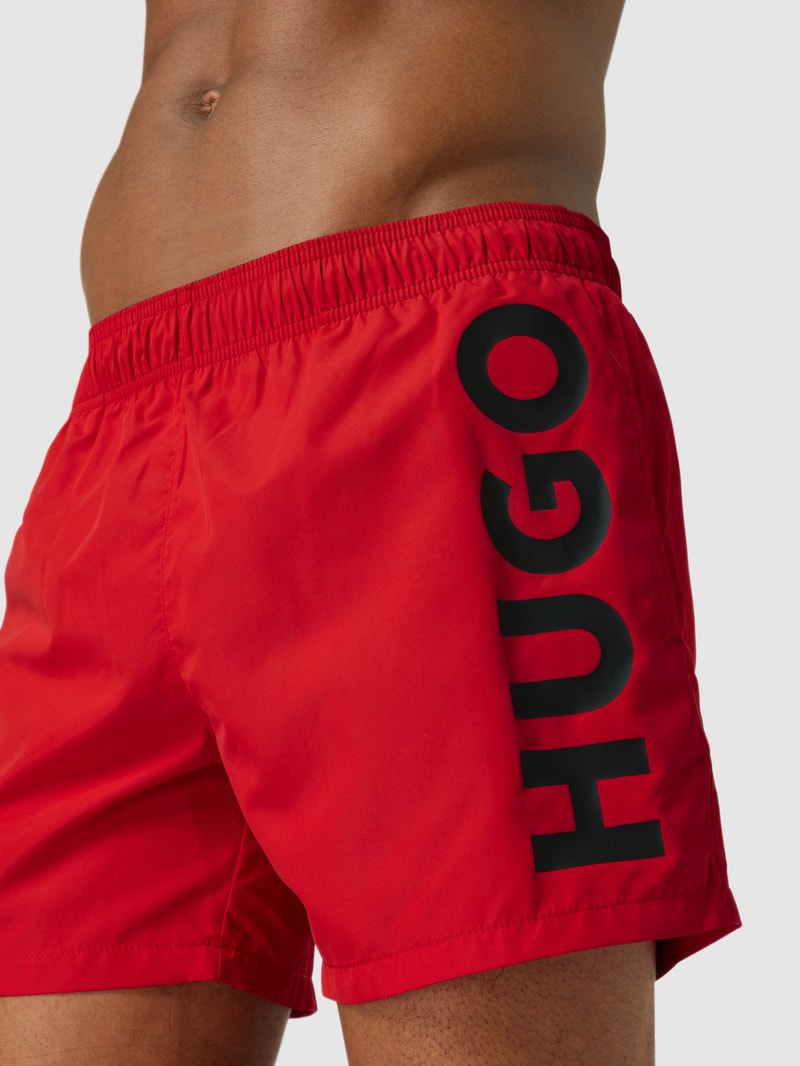 Badehose mit Label-Schriftzug Modell 'ABAS' in rot