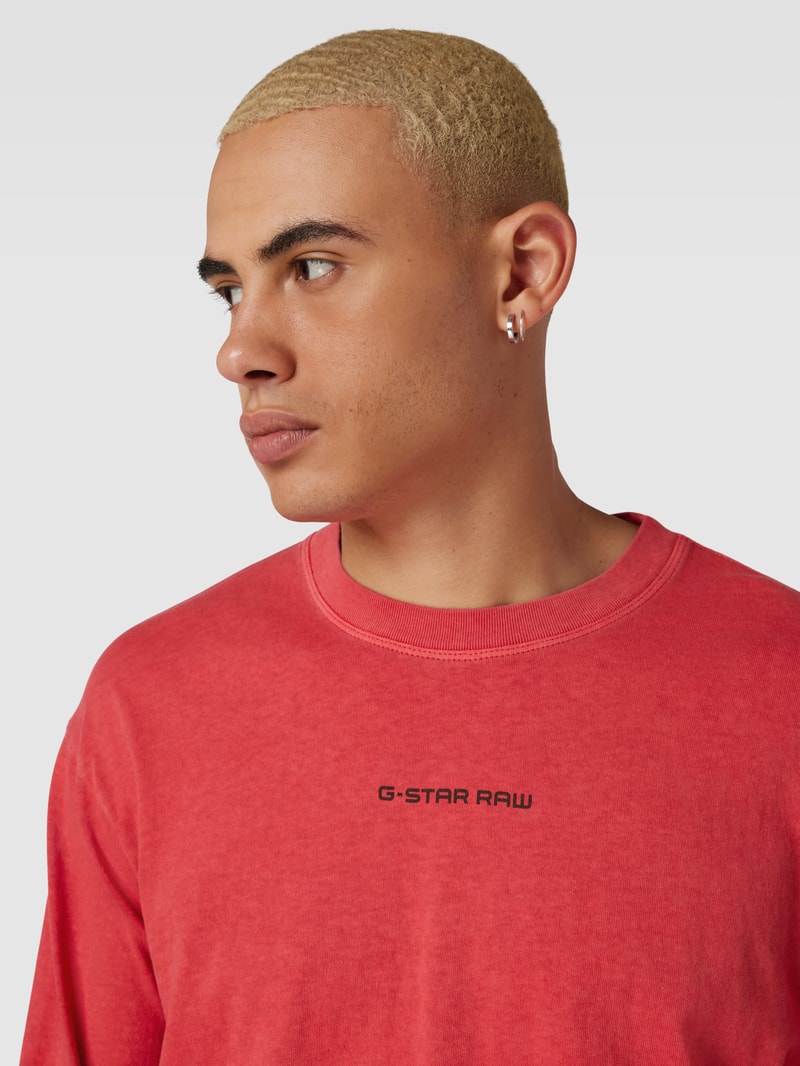 Sweatshirt in unifarbenem Design mit Label-Print in rot