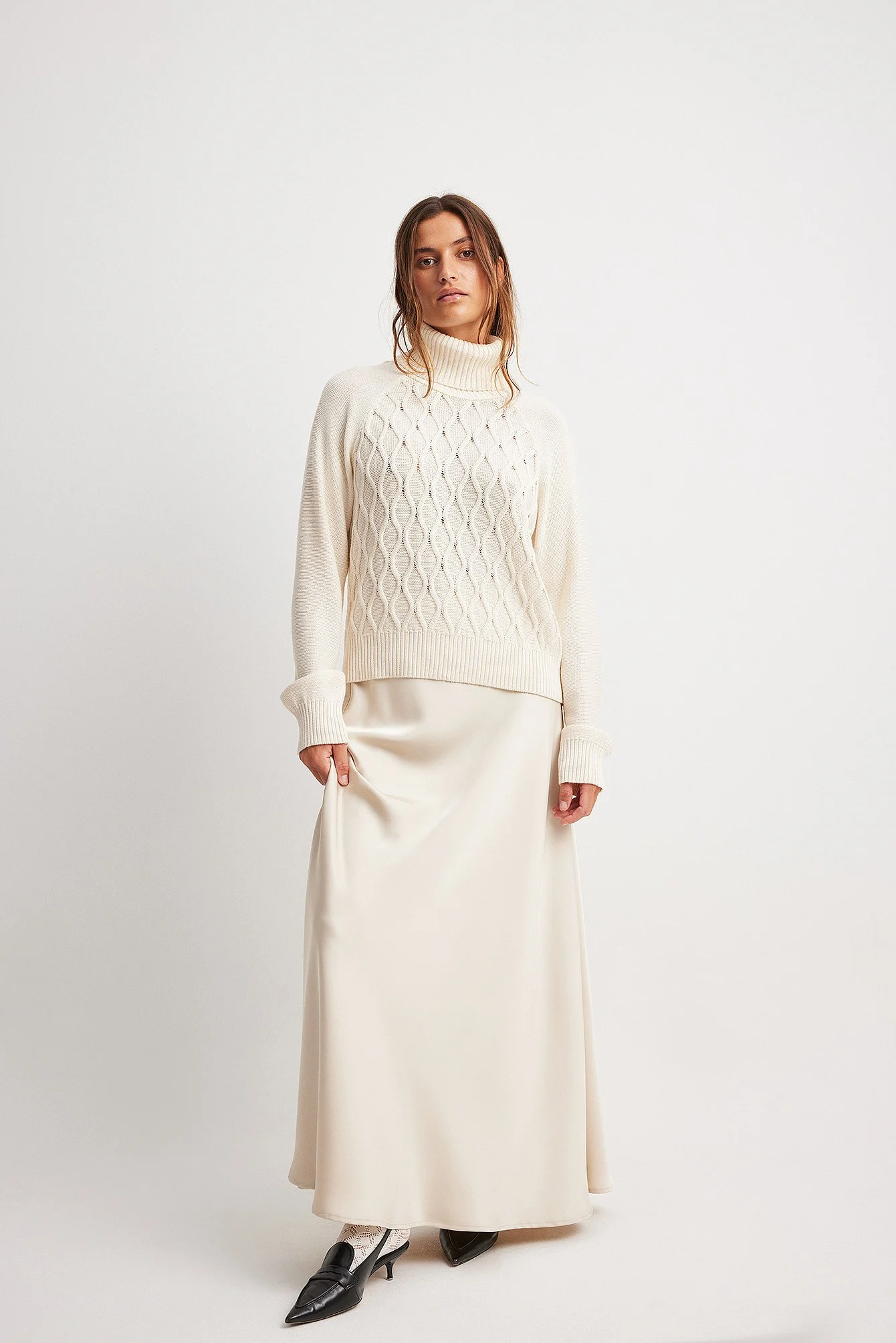 Strickpullover mit Rollkragen und Zopfmuster