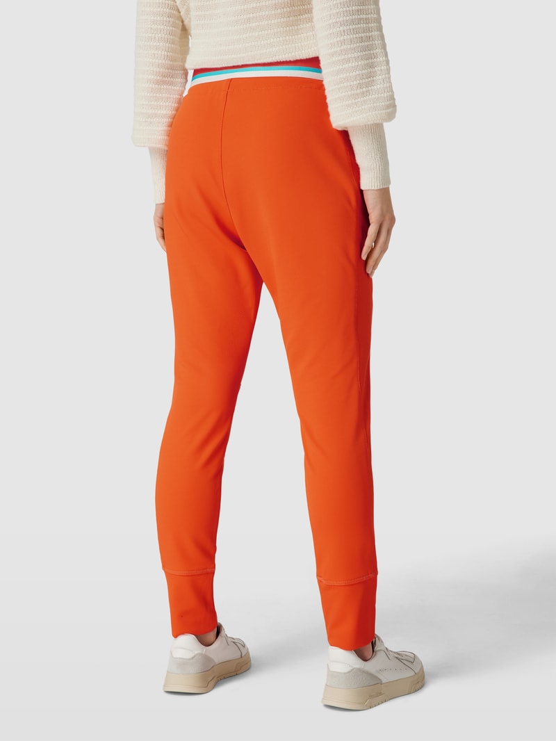 Sweatpants mit Teilungsnähten Modell 'FUTURE 4.0' in orange