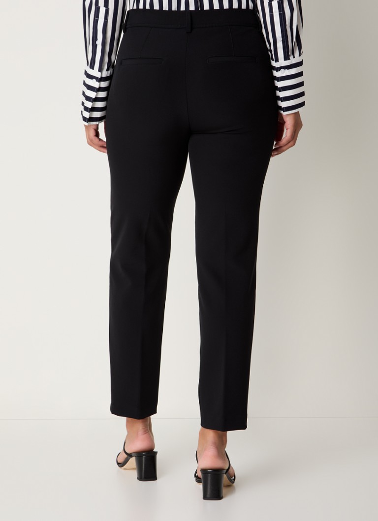 Pantaloni chino BRAX marroni a vita media, vestibilità slim ed elasticizzata.