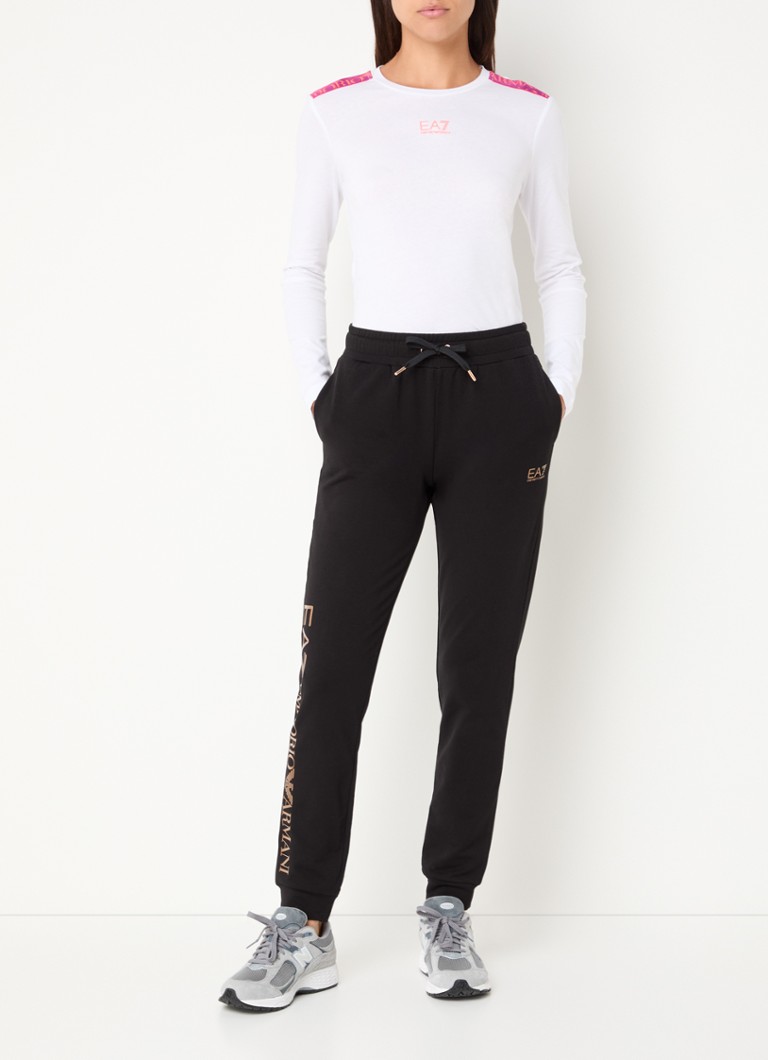 Pantaloni da tuta affusolati a vita media di Emporio Armani con stampa logo.
