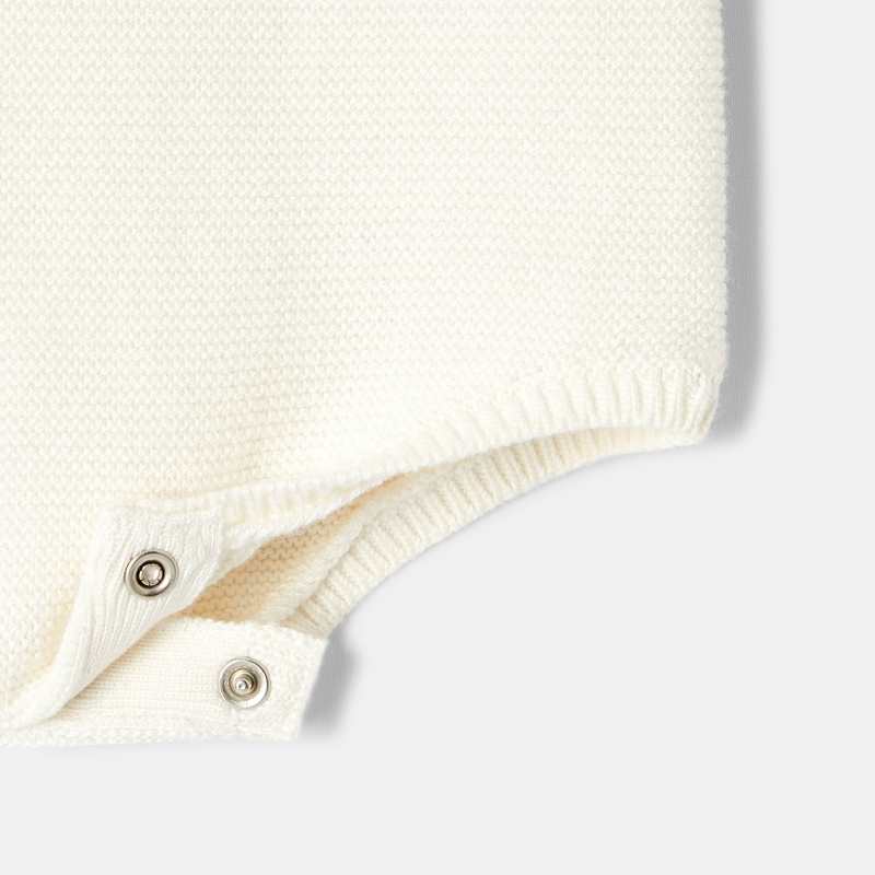Barboteuse à bretelles en tricot blanc naissance Absorba