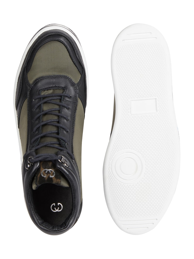 Plateau-Sneaker aus Leder mit Leopardenmuster in schwarz