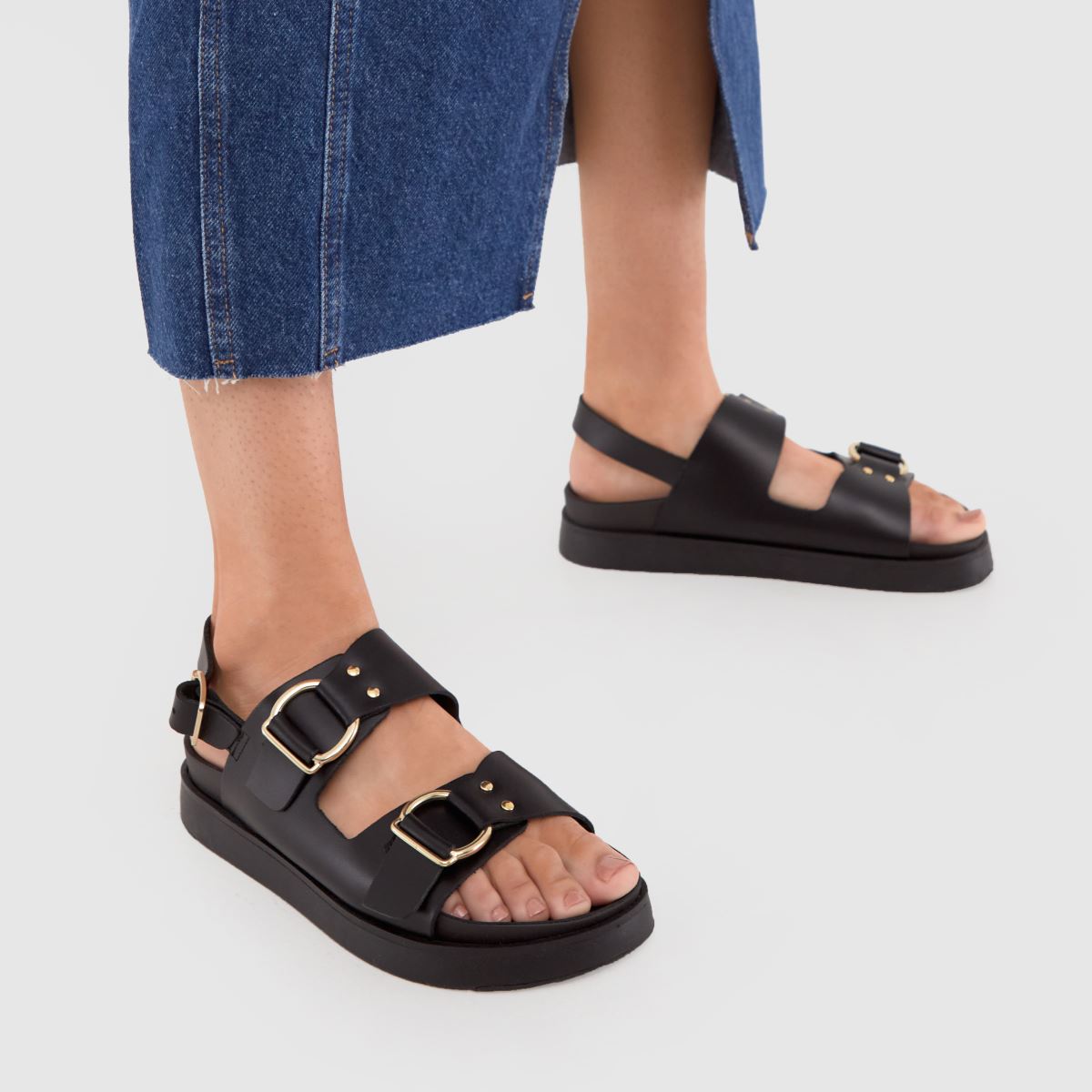 Schuh Tegan csatos szandálok fekete színben