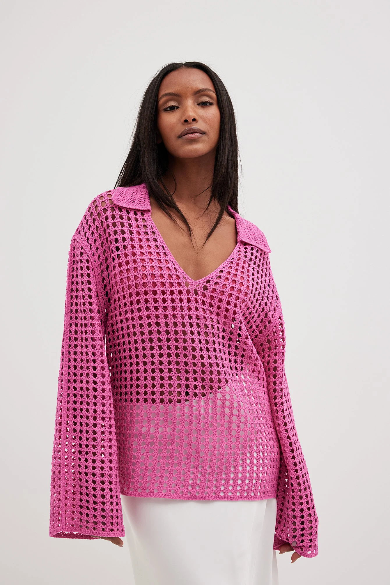 Gehäkelter Strickpullover mit V-Ausschnitt
