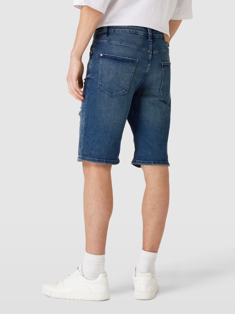 Jeansshorts im Destroyed-Look in dunkelblau