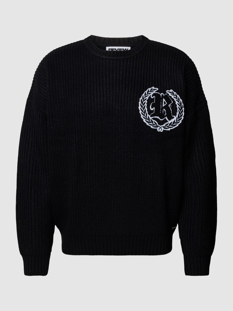 Strickpullover mit überschnittenen Schultern in schwarz