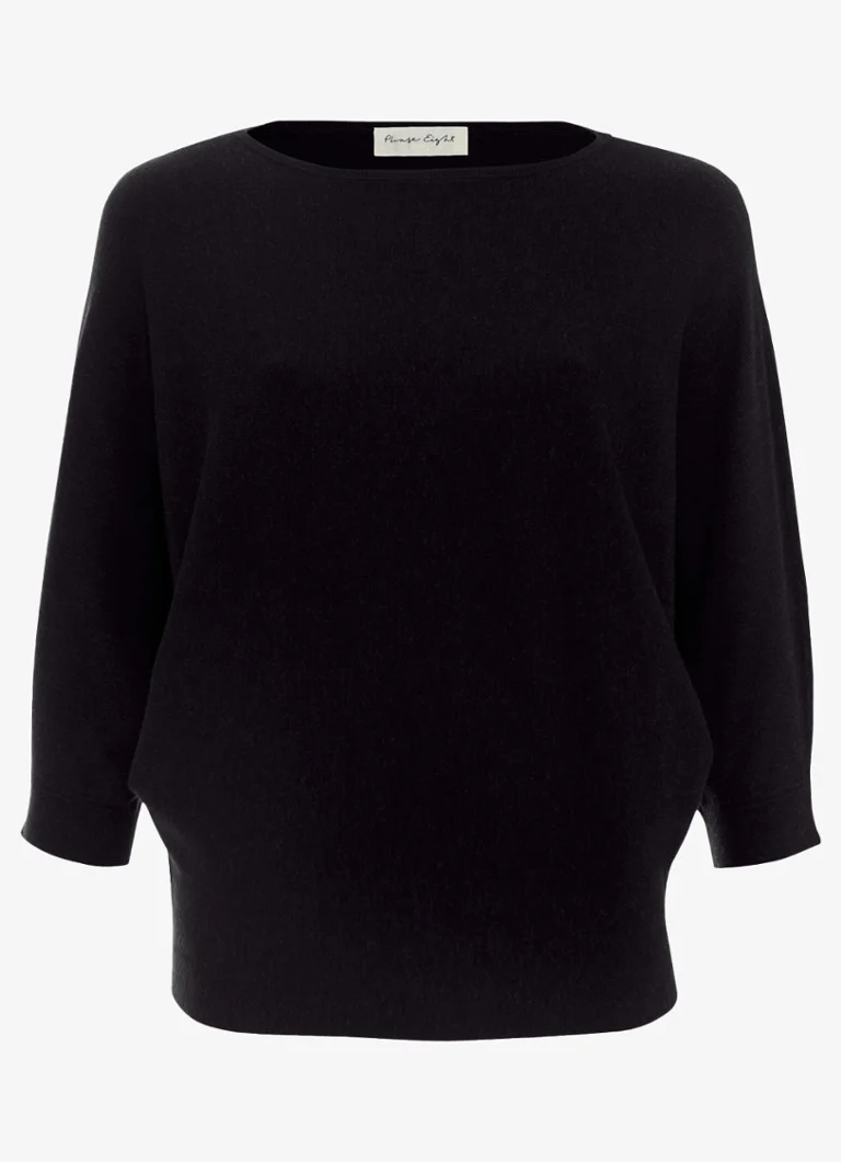 Tricou Cristine de la Phase Eight, confecționat din material tricotat subțire și elastic.