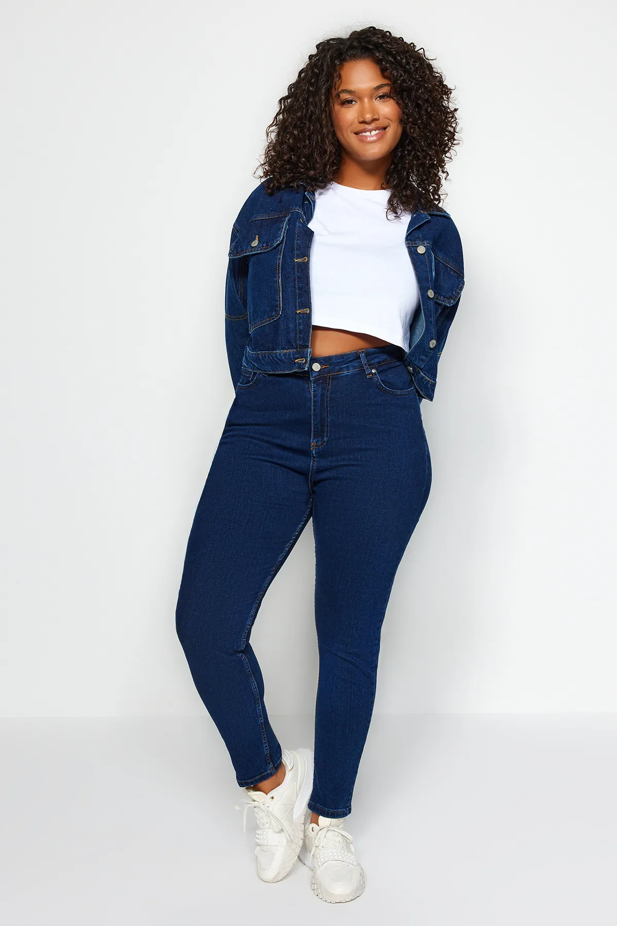 Trendyol Curve  Dunkelblaue, dehnbare Skinny-Jeans mit hoher Taille TBBSS22JE0075